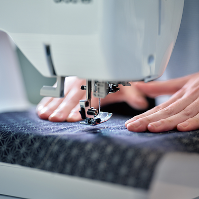 Sewing process at creative workshop